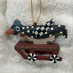 Mackenzie-Childs Penguin Sledding Ornament